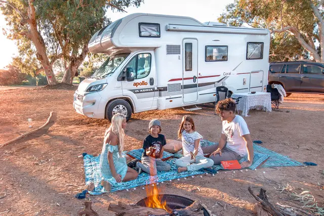 Family in front of Campervan in Australia